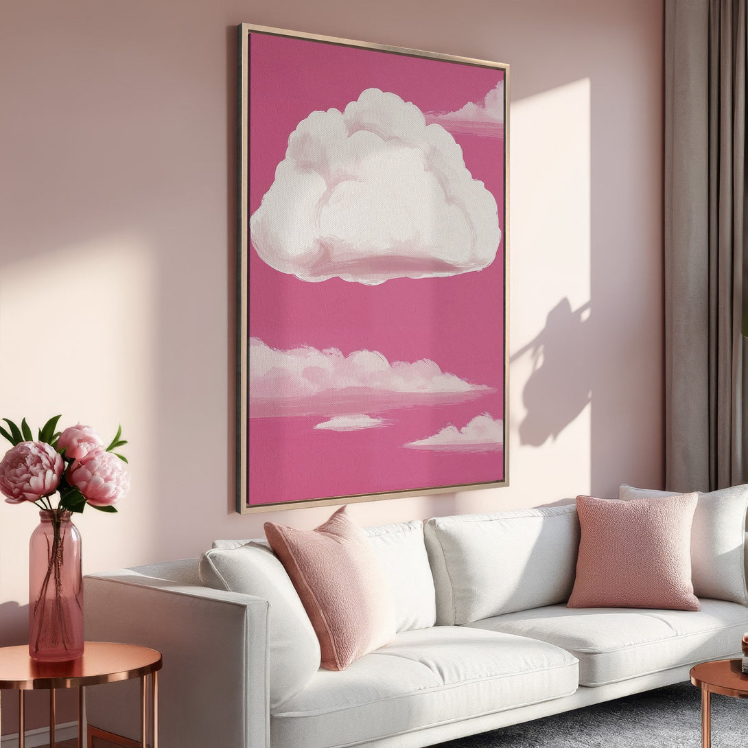 Framed Wall Art featuring a dreamy cloudscape in pink and white. Modern abstract painting adds a pop of color to any living room. Shop now!