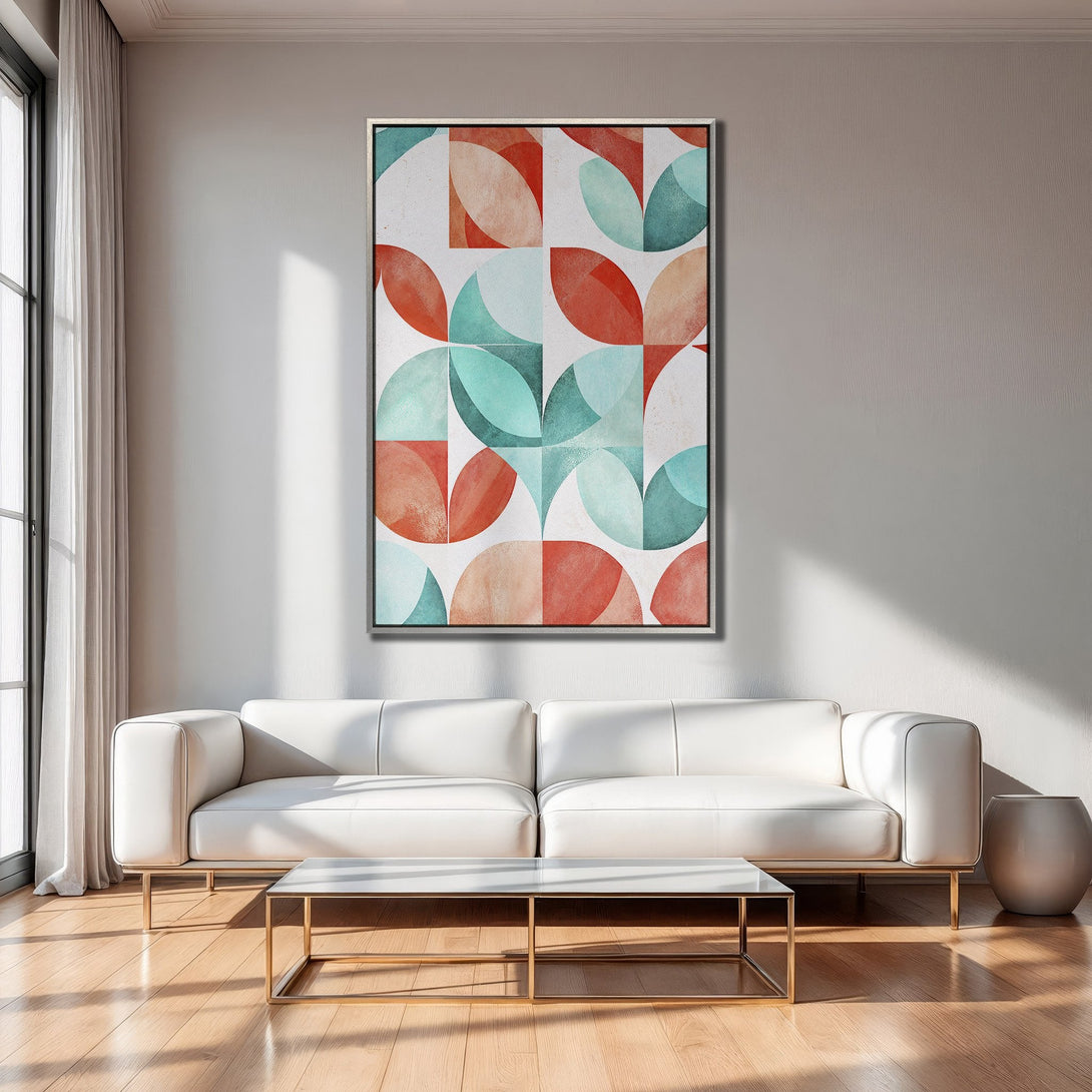 Framed Wall Art featuring a modern geometric design in red, teal, and peach. Perfect for adding a pop of color to any living space.