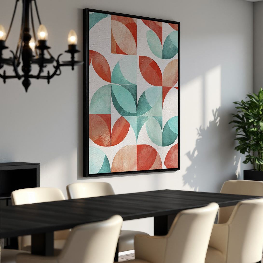 Framed Wall Art featuring a geometric abstract design in teal, coral, and peach tones, perfect for modern home decor.