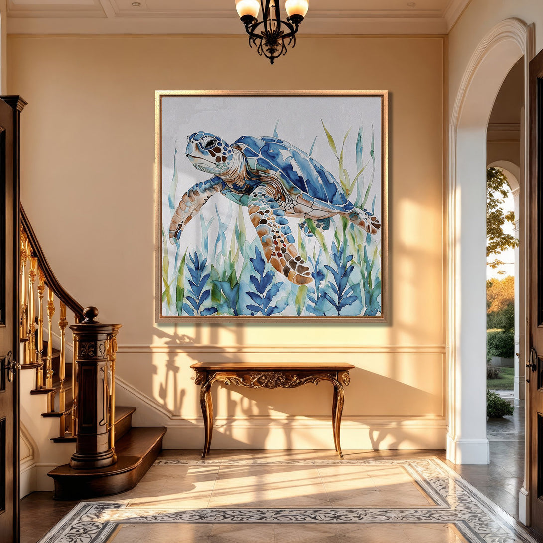 Framed Wall Art featuring a watercolor sea turtle in blue and brown hues. Coastal style Canvas Print adds serene elegance to any home.