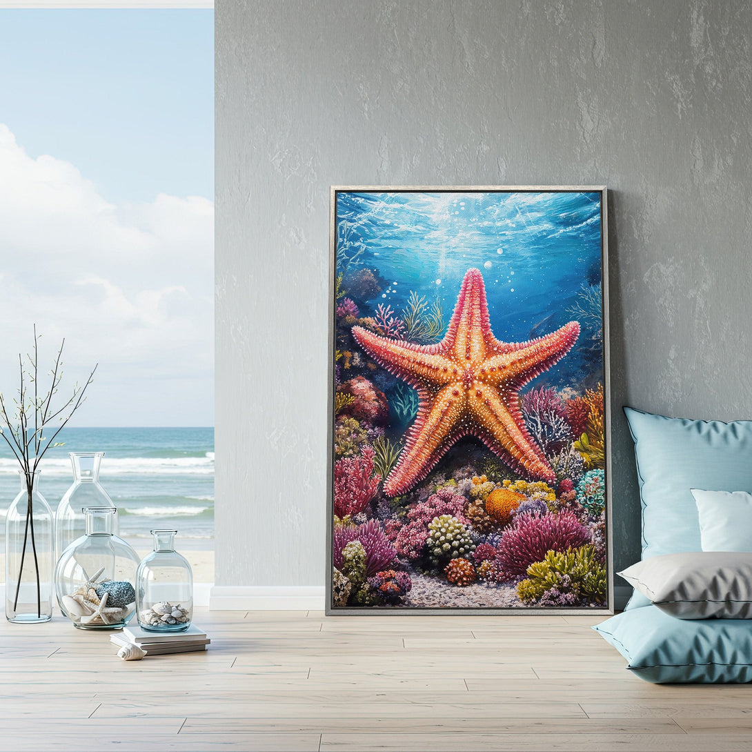 Framed Wall Art: Stunning starfish canvas print in vibrant coral reef scene. Coastal decor with a blue, pink, and orange color palette. Perfect for beach house vibes!