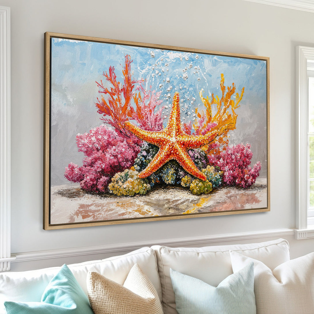 Framed Wall Art featuring a vibrant starfish painting in a coastal style. Beautiful coral and a warm, colorful palette of orange, pink, and blue. Perfect for beach decor.