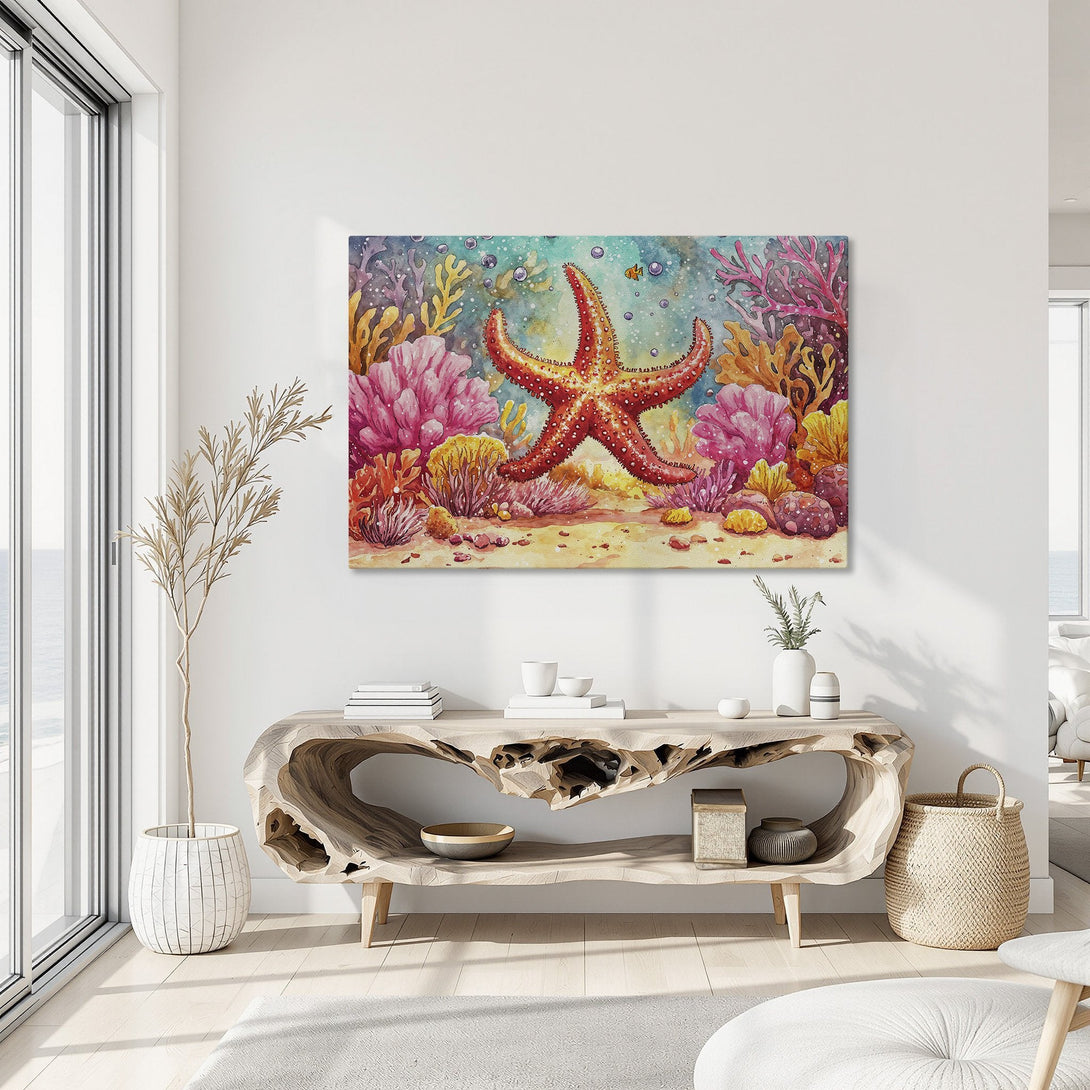 Framed Wall Art featuring a vibrant watercolor starfish & coral reef. Coastal-inspired art with a colorful palette of pink, orange, & teal.