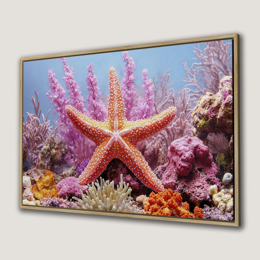 Framed Wall Art featuring a vibrant coral reef scene with a starfish, in a colorful palette of pinks, oranges, and blues. Perfect ocean-themed decor!