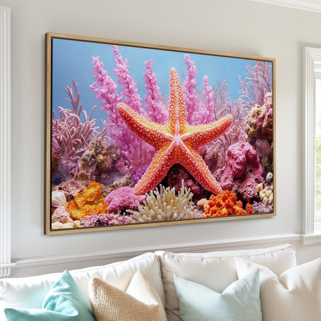 Framed Wall Art featuring a vibrant starfish and coral reef scene. Coastal decor in a colorful palette of pinks, oranges, and blues. Bring the ocean to your home!