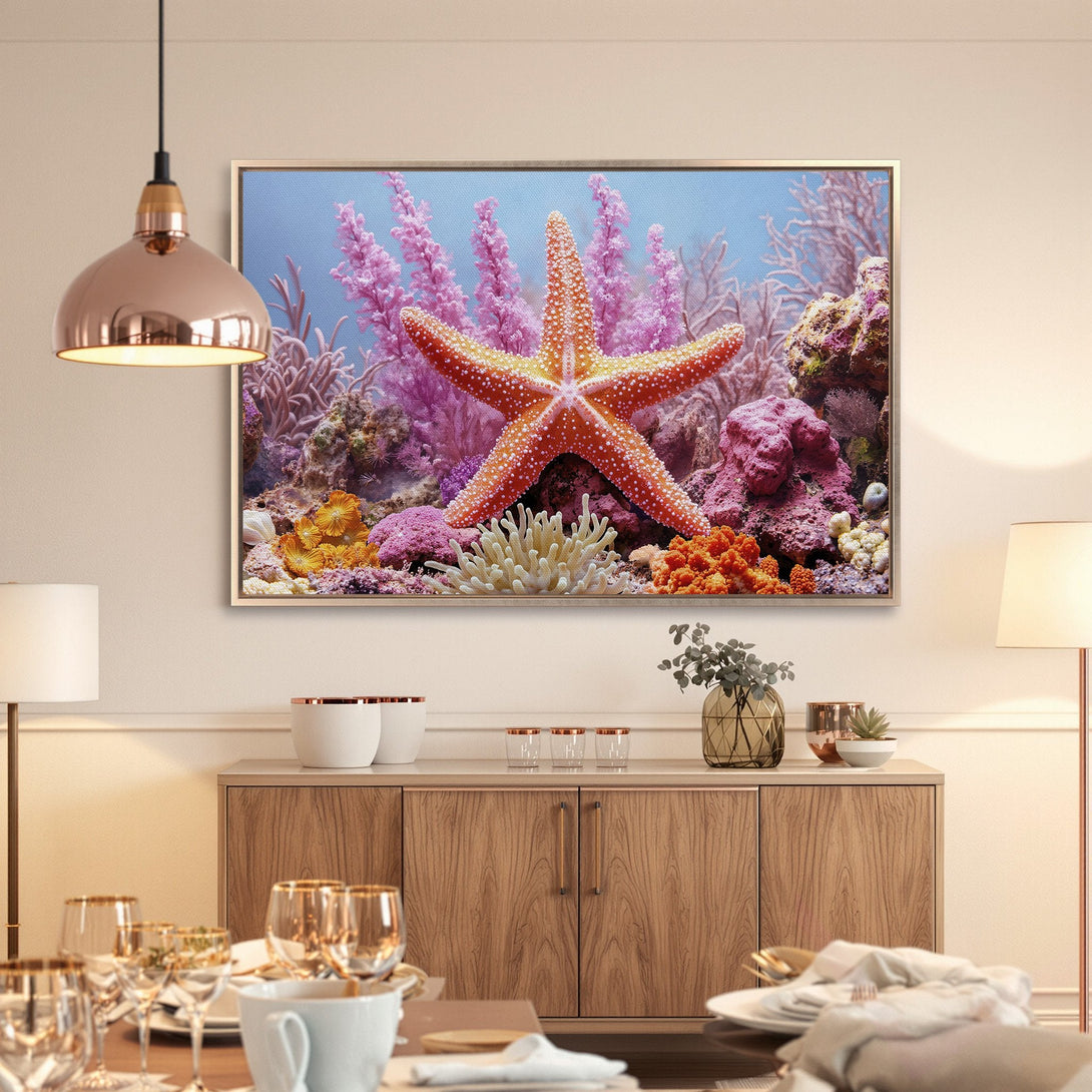 Framed Wall Art: Vibrant starfish & coral reef scene, warm orange, pink, and blue palette. Coastal decor for a stylish home.