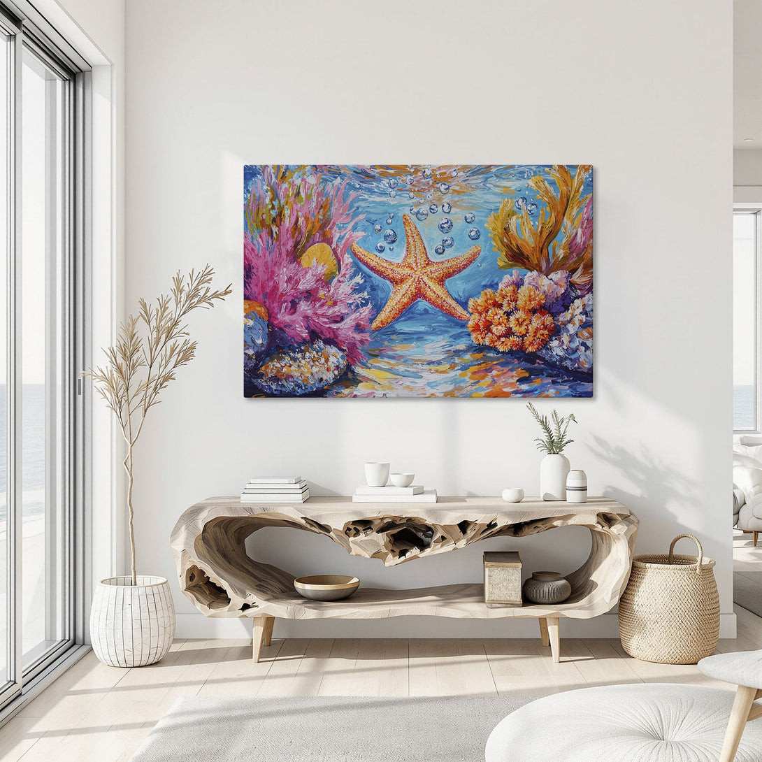 Framed Wall Art of a vibrant starfish underwater scene. Colorful, impressionistic style with a blue, orange, and pink palette. Perfect coastal decor!