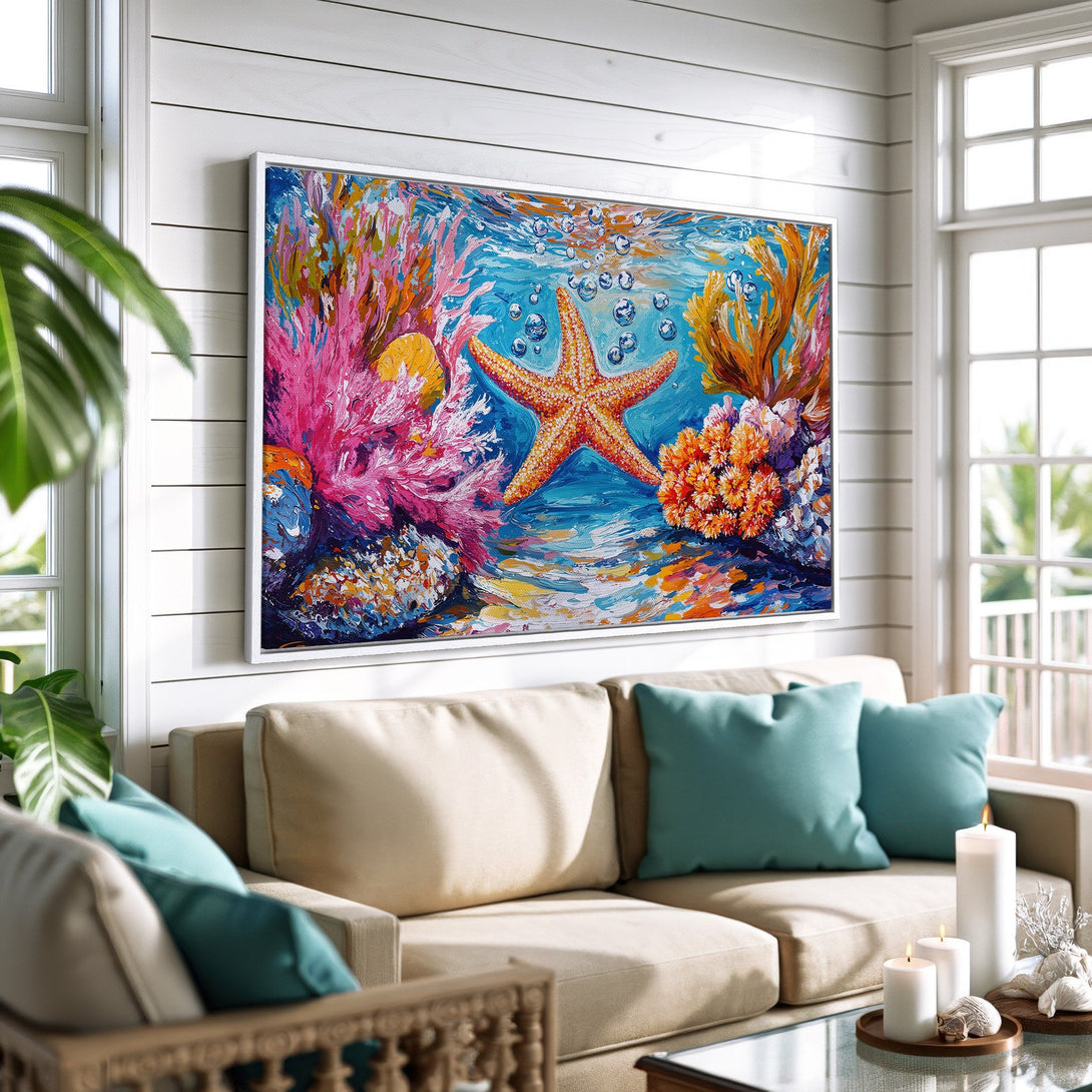 Framed Wall Art: Vibrant starfish and coral reef painting in a coastal style. Colorful canvas print with blue, orange, and pink hues. Perfect beach house decor.