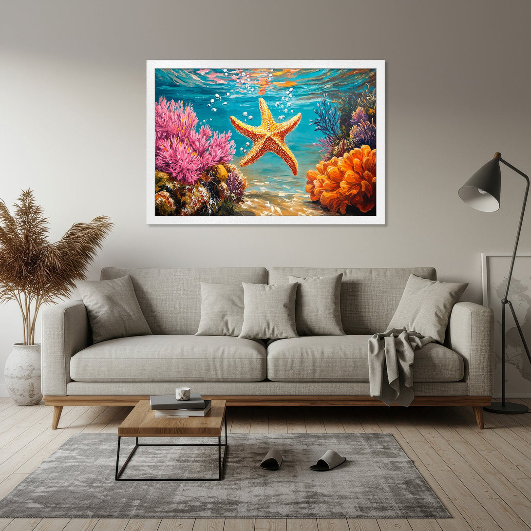 Framed Poster featuring a vibrant starfish and coral reef art in a vivid blue, orange, and pink color palette. Perfect ocean-themed decor.