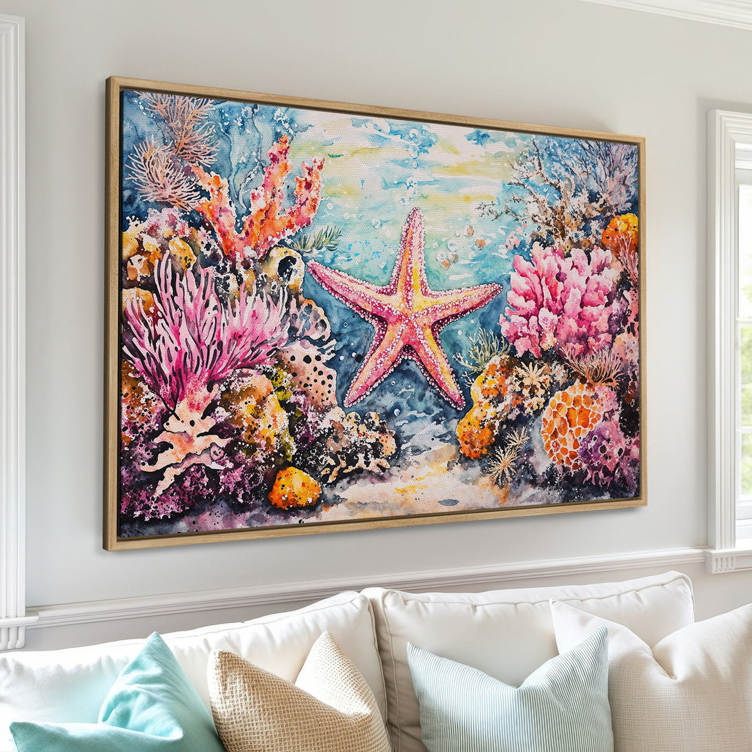 Framed Wall Art featuring a vibrant watercolor starfish and coral reef scene. Coastal art in a colorful palette of pinks, blues, and oranges. Perfect for home decor.