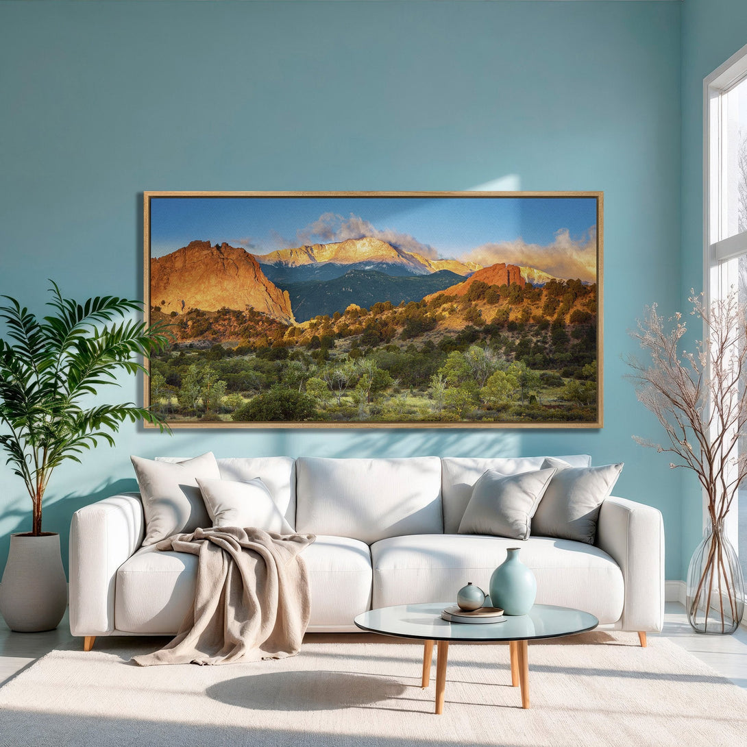 Framed Wall Art of a mountain landscape in warm tones. Adds a touch of nature and style to any room. Perfect for living rooms.