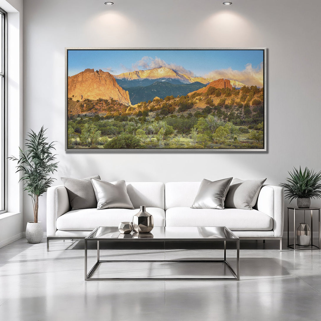 Framed Wall Art: Stunning mountain landscape Canvas Print with warm sunset hues, perfect for adding a touch of nature to your modern living room.