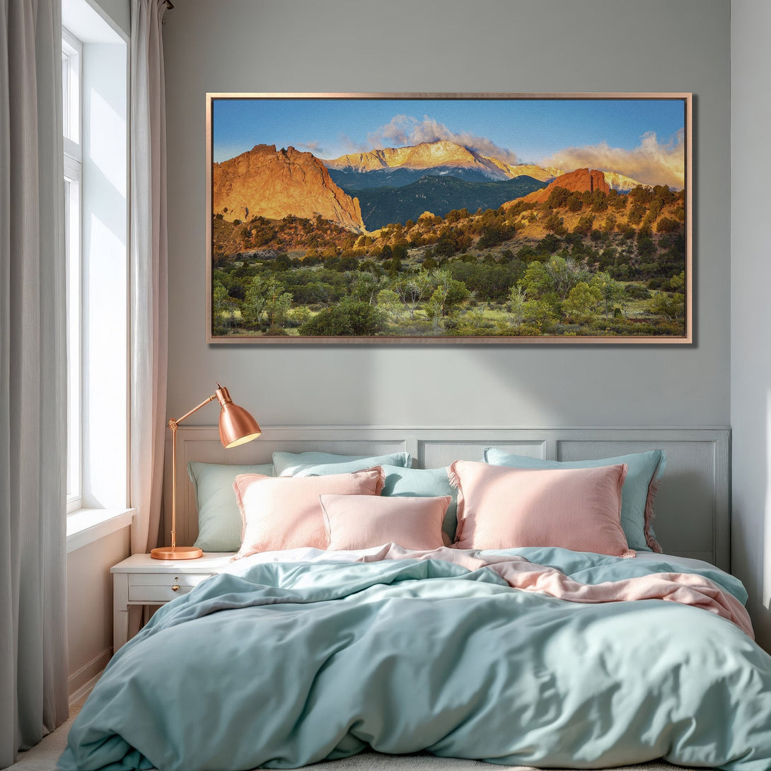 Framed Wall Art of a mountain landscape in warm earth tones. Adds a touch of nature and serenity to any bedroom. Perfect for a calming space.