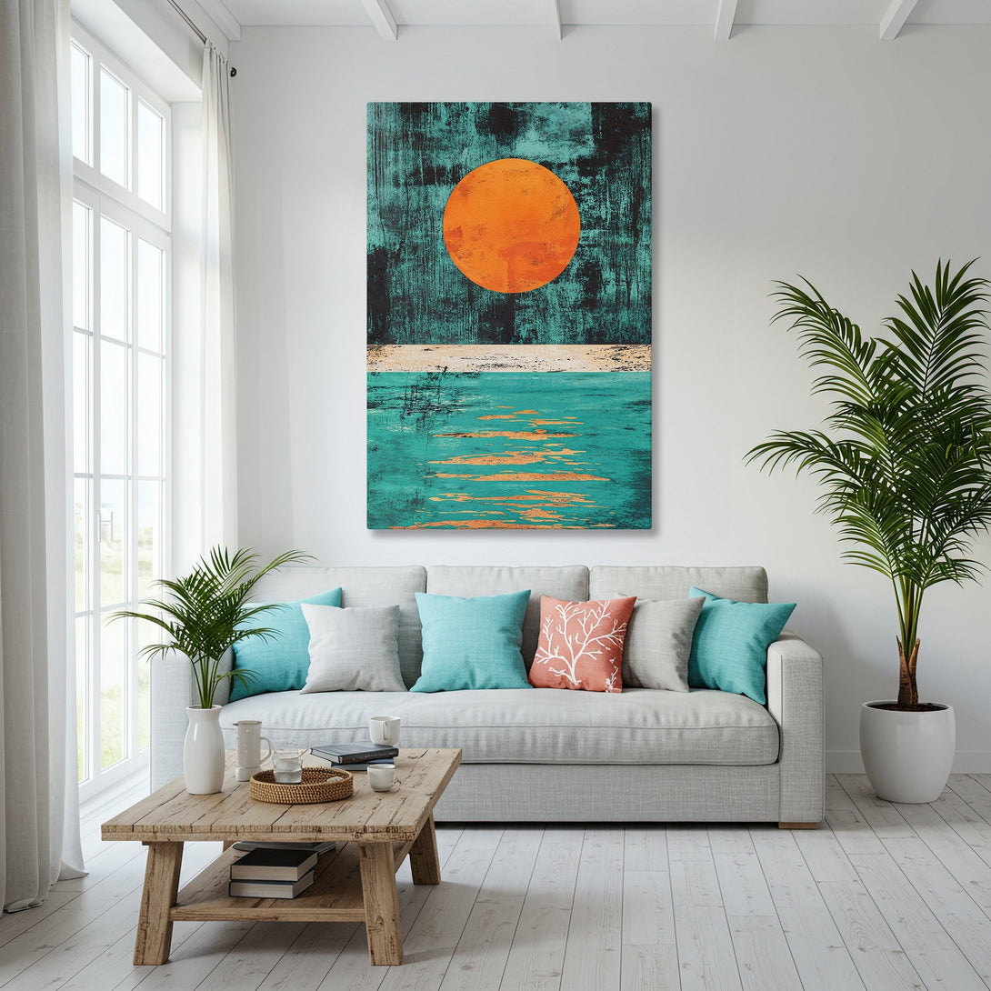 Framed Wall Art: Abstract sunset canvas print in teal and orange, displayed in a coastal living room. Modern art with a gold frame, perfect for beach house decor.