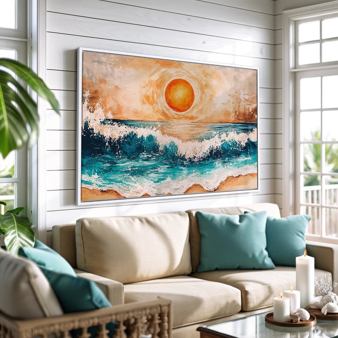 Framed Wall Art: Coastal sunset canvas print in a modern living room. Features a vibrant ocean scene with teal, orange, and beige hues. Perfect for beach decor.