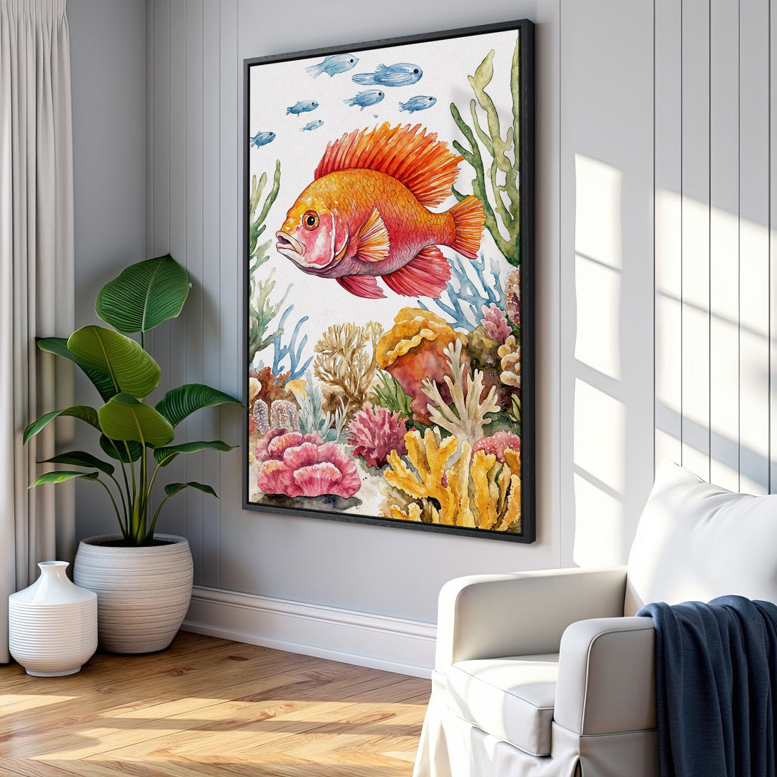 Framed Wall Art: Watercolor fish print in a coastal style. Features vibrant orange, coral, and blue hues. Perfect for adding a pop of color to any room.