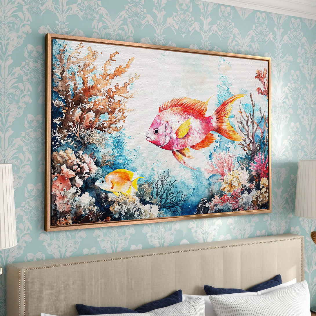 Framed Wall Art featuring vibrant watercolor fish and coral. Coastal-inspired artwork with a warm, colorful palette. Perfect for adding a pop of color to any room.
