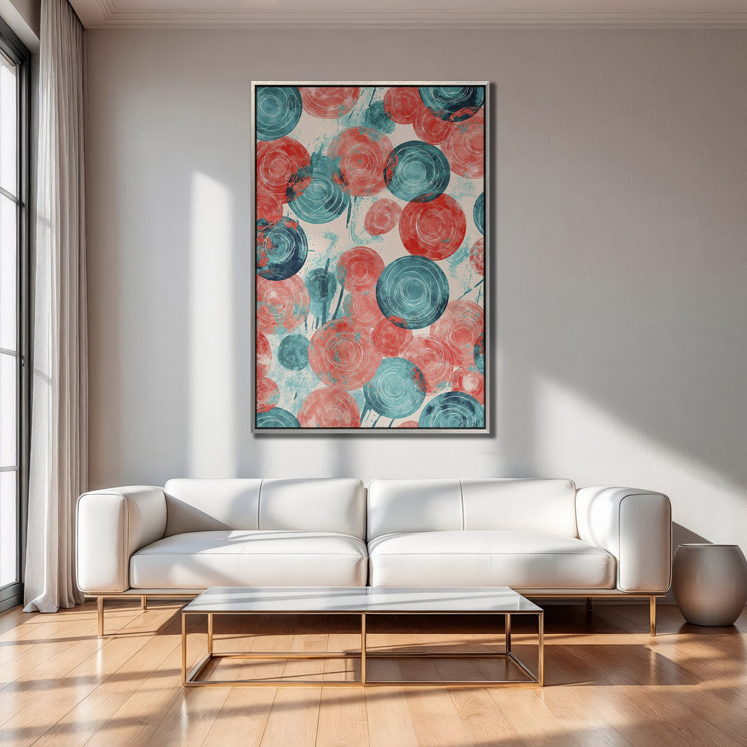 Framed Wall Art featuring abstract circles in teal and coral. Modern art print for living room decor, adds a pop of color.