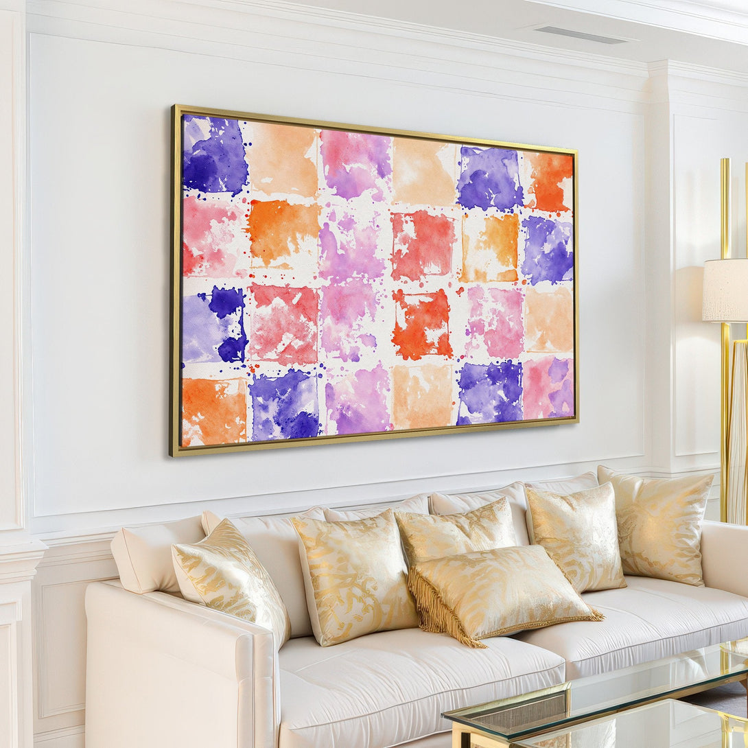Canvas Print featuring abstract watercolor squares in a modern living room. Vibrant palette of blues, oranges, and pinks. Perfect wall art!