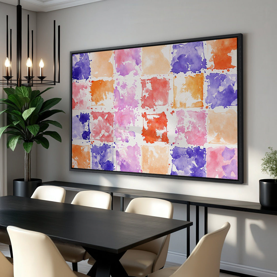 Framed Wall Art: Abstract watercolor canvas print in a dining room. Features a colorful palette of pink, orange, and purple squares. Perfect for modern decor.