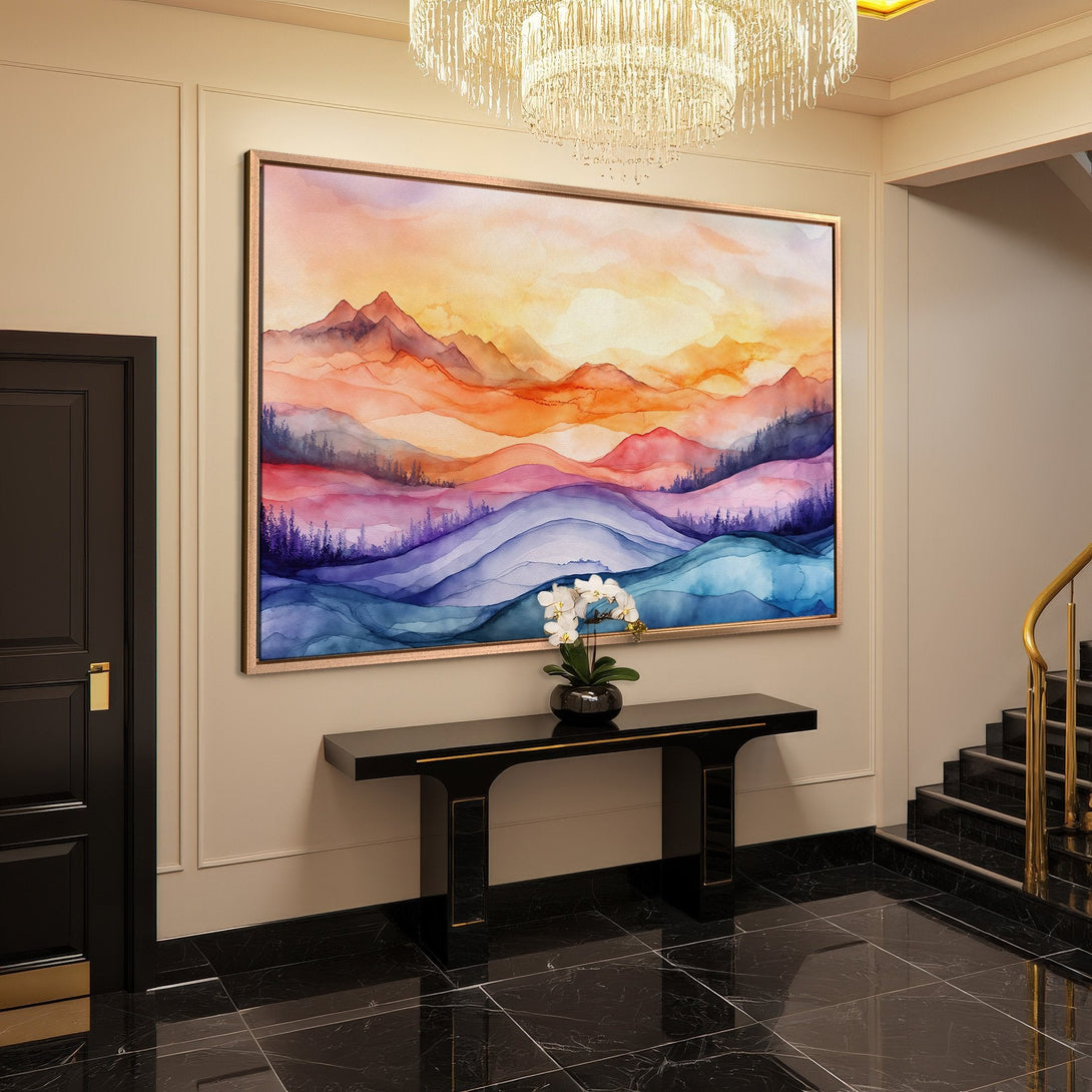 Framed Wall Art featuring a watercolor mountain landscape in vibrant orange, purple, and blue hues. Perfect for adding a touch of art to your space.