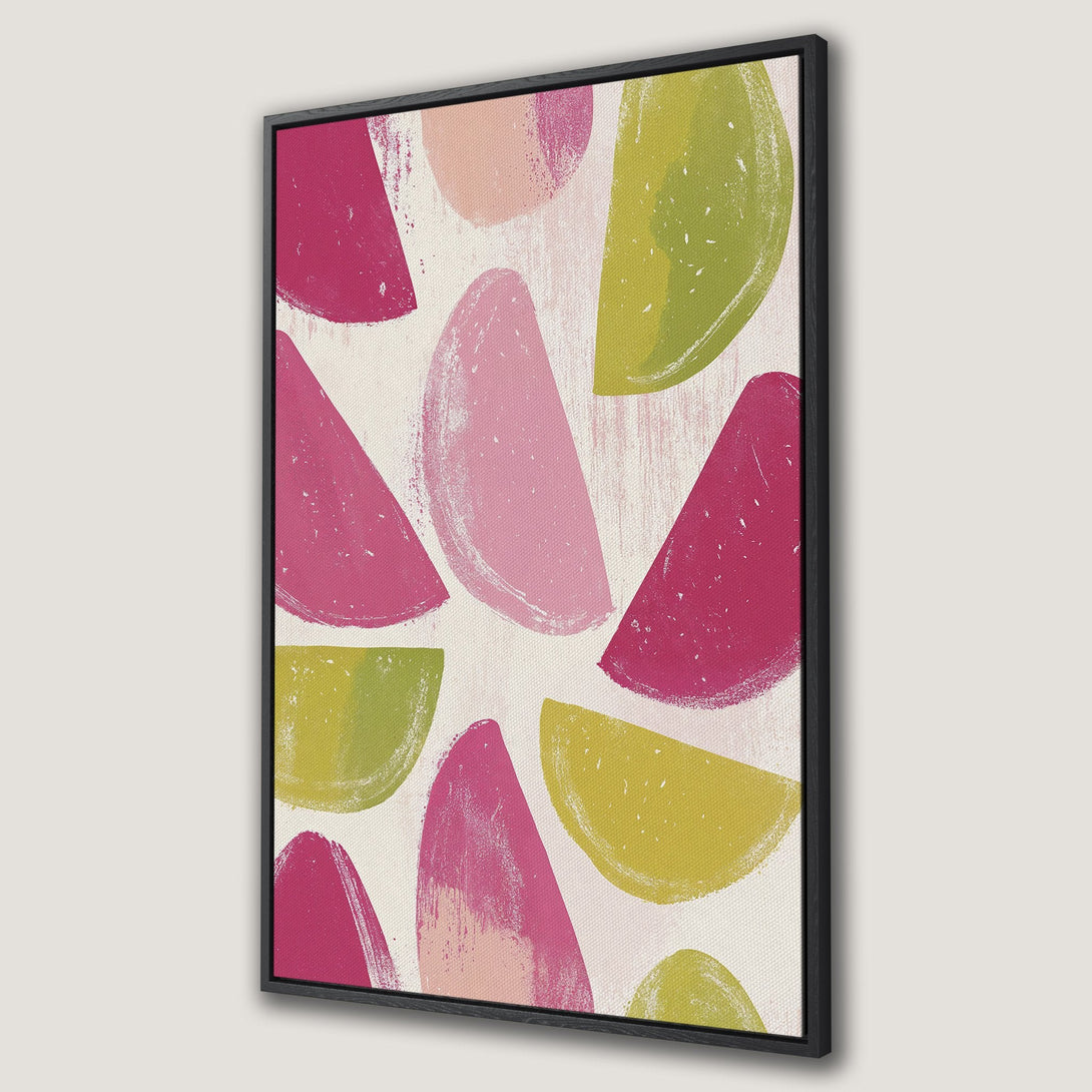 Framed Wall Art featuring abstract fruit slices in pink, green, and yellow on a neutral background. Modern art for a stylish home.