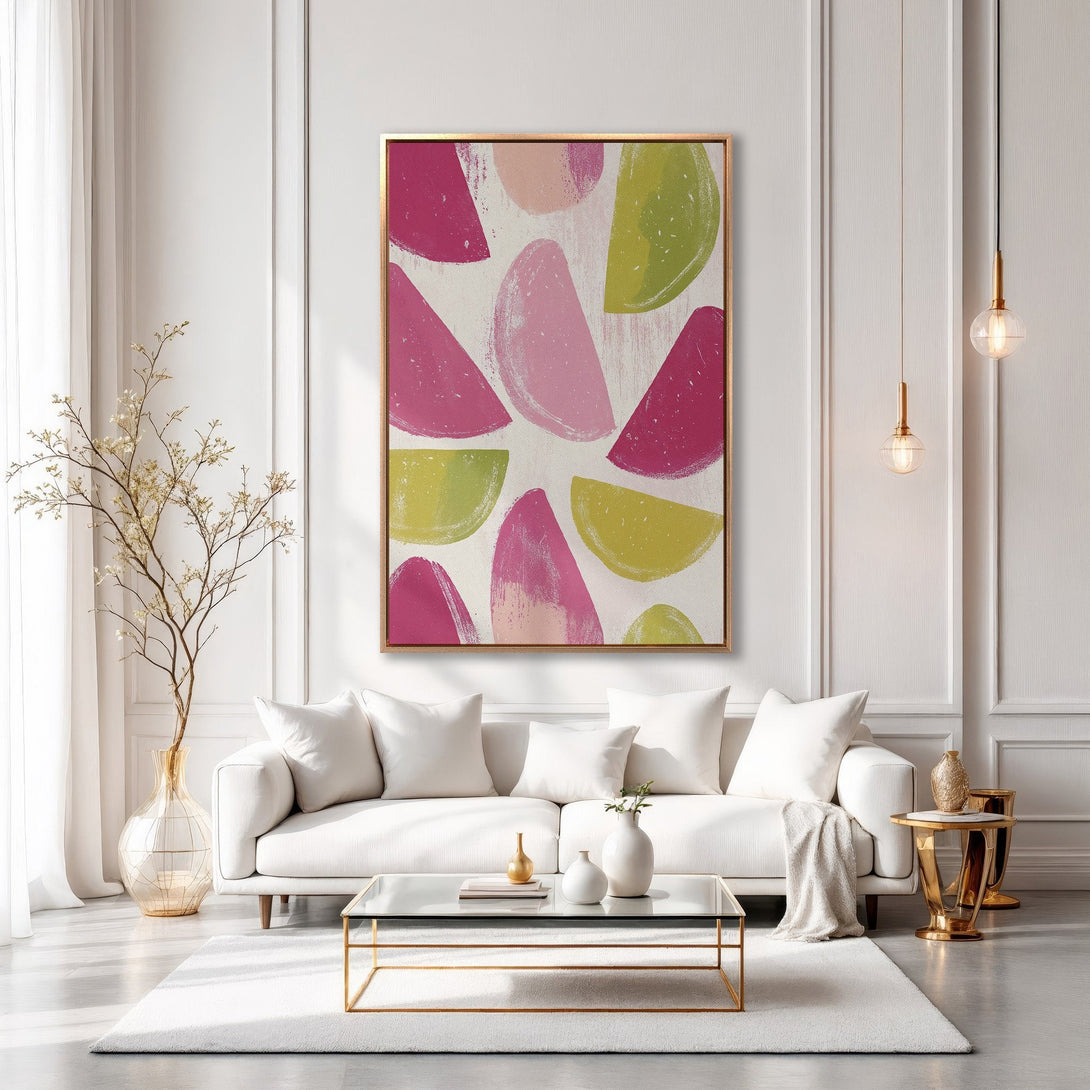 Framed Wall Art: Abstract brushstroke design in pinks and greens. Modern canvas print adds a pop of color to a stylish living room.