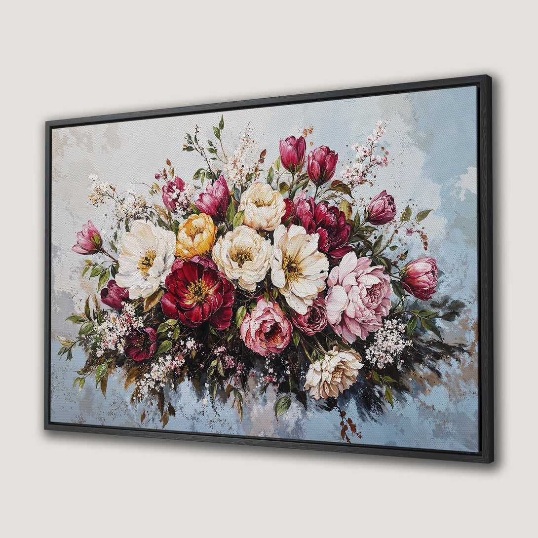 Framed Wall Art featuring a vibrant floral bouquet in a painterly style. Rich reds, pinks, and creams pop against a soft blue background.