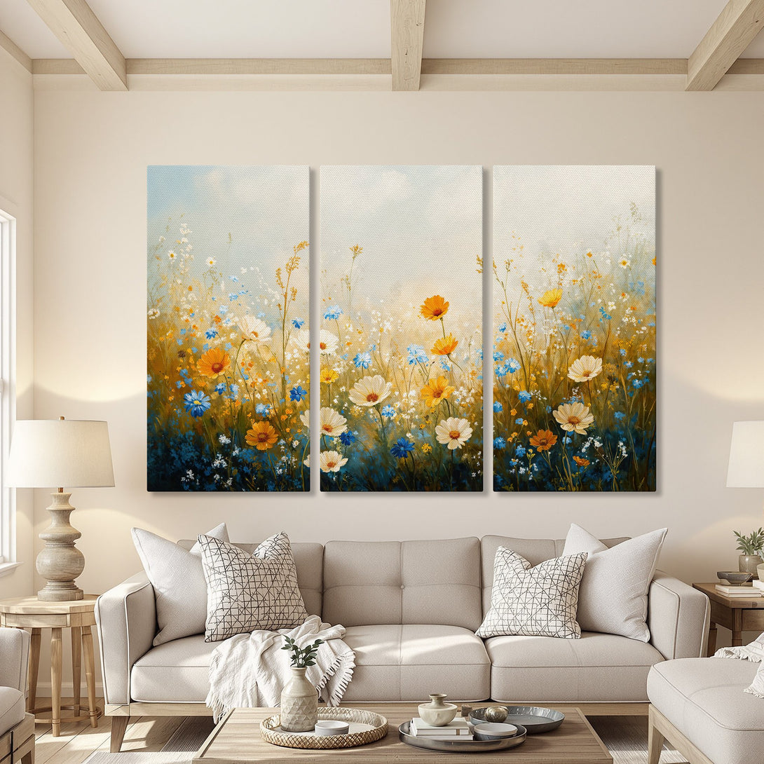 Canvas Print of a vibrant floral meadow in a soft, impressionistic style. Features a warm color palette with blues, yellows, and whites. Perfect wall art!