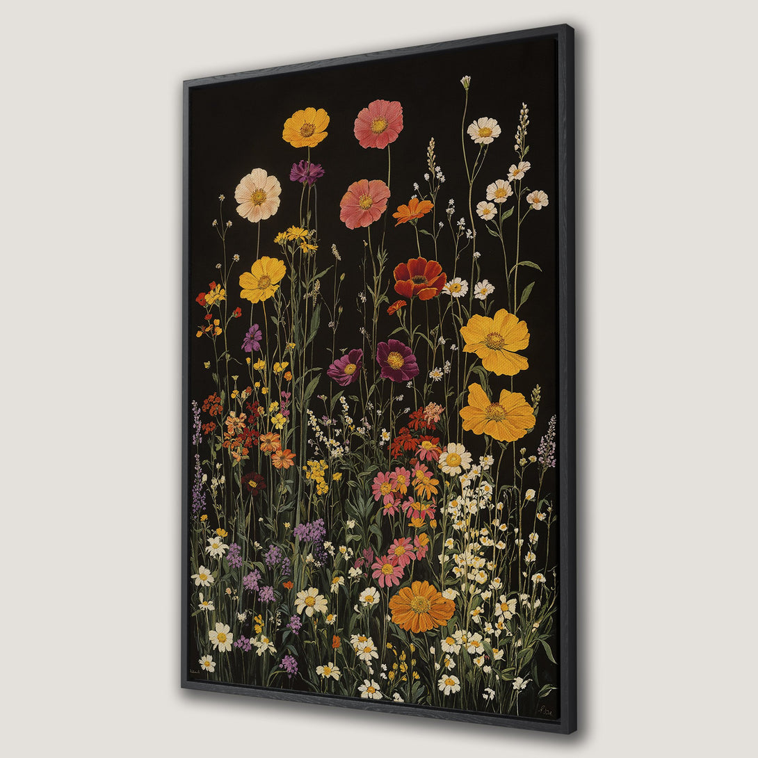 Framed Wall Art featuring a vibrant floral meadow against a black background. Warm, colorful blooms in yellow, pink, and orange create a stunning contrast. Perfect home decor!