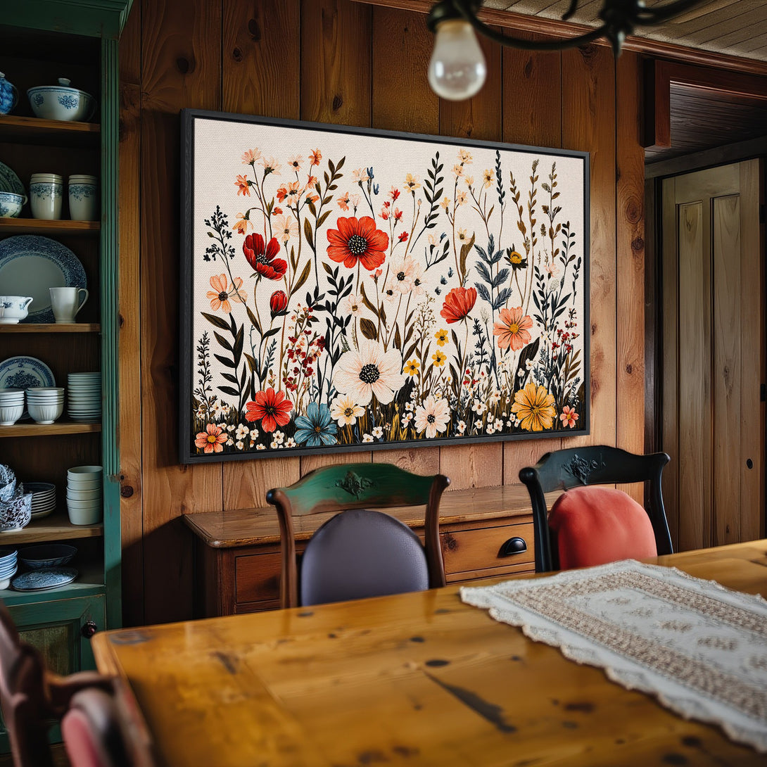 Framed Wall Art: Floral canvas print in a rustic dining room, featuring colorful wildflowers on a neutral background. Perfect for farmhouse decor with a warm palette.