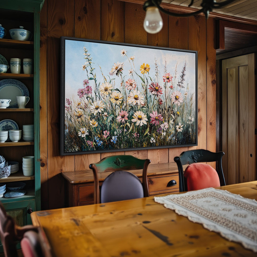 Framed Wall Art: Impressionist floral painting in a rustic dining room. Features a vibrant color palette of pink, yellow, and green. Perfect home decor.