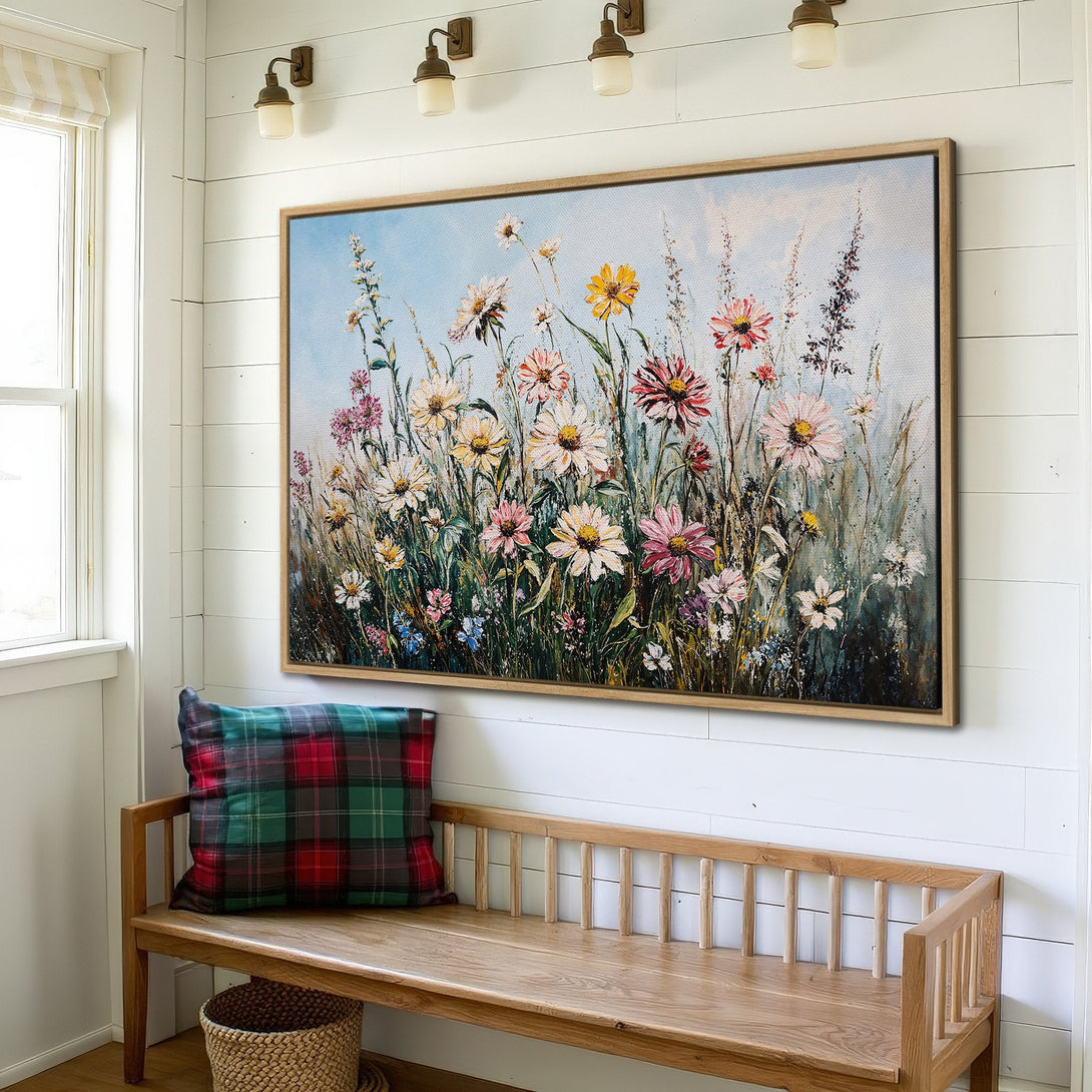 Framed Wall Art: Floral canvas print in a rustic interior. Featuring a vibrant wildflower meadow with a soft, pastel color palette.