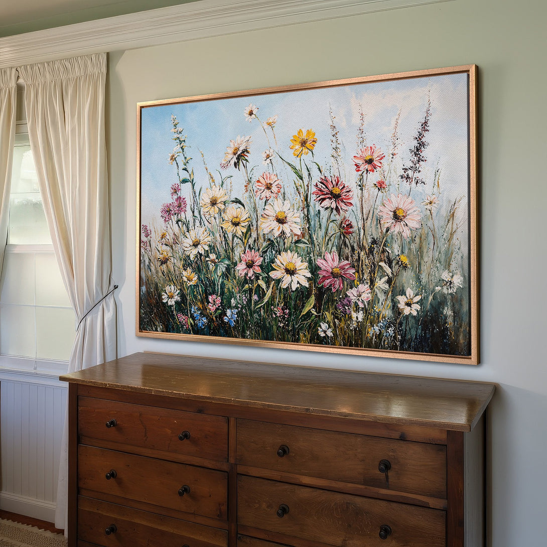 Framed Wall Art: Impressionist floral painting in a bedroom. Features daisies in pink, yellow, and white with a blue and green palette.