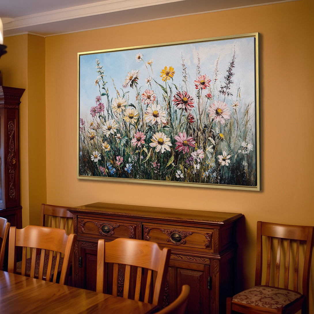 Canvas Print of a vibrant wildflower meadow painting, displayed in a cozy living room. Features a warm, neutral color palette.