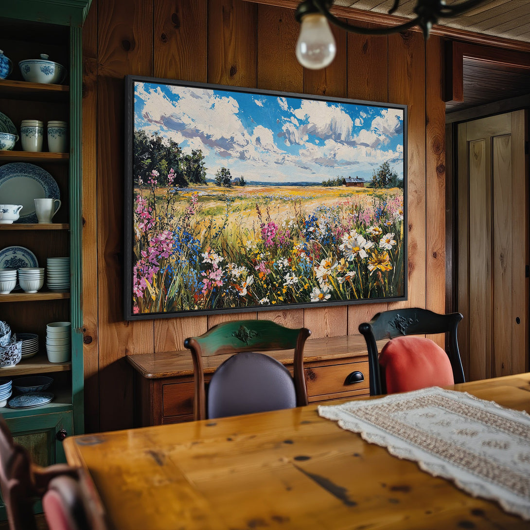 Framed Wall Art: Impressionist landscape Canvas Print with vibrant wildflowers, blue sky, and warm, rustic interior. Bring nature's beauty home!