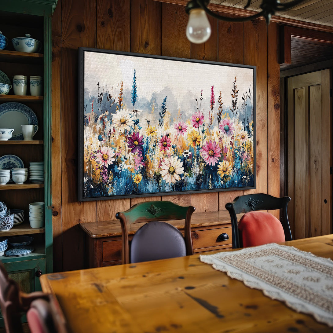 Framed Wall Art: Colorful floral Canvas Print in a rustic interior. Features vibrant flowers against a blue and neutral backdrop. Perfect for home decor!