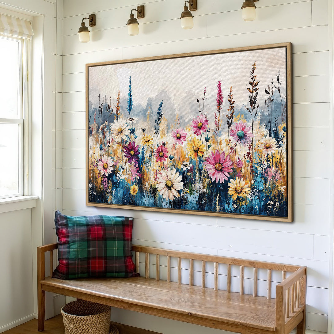Framed Wall Art: Colorful floral canvas print in a rustic interior. Features vibrant pink, yellow, and blue hues, perfect for adding a touch of nature to your space.