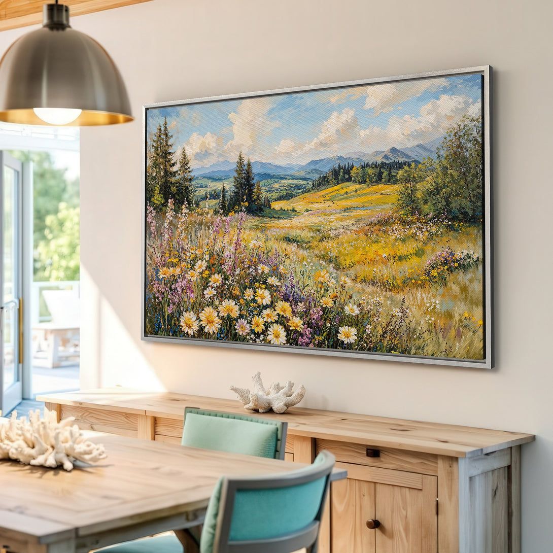 Framed Wall Art: Landscape Canvas Print with vibrant wildflowers and mountain view. Warm yellow, green, and blue color palette. Perfect for living room decor.