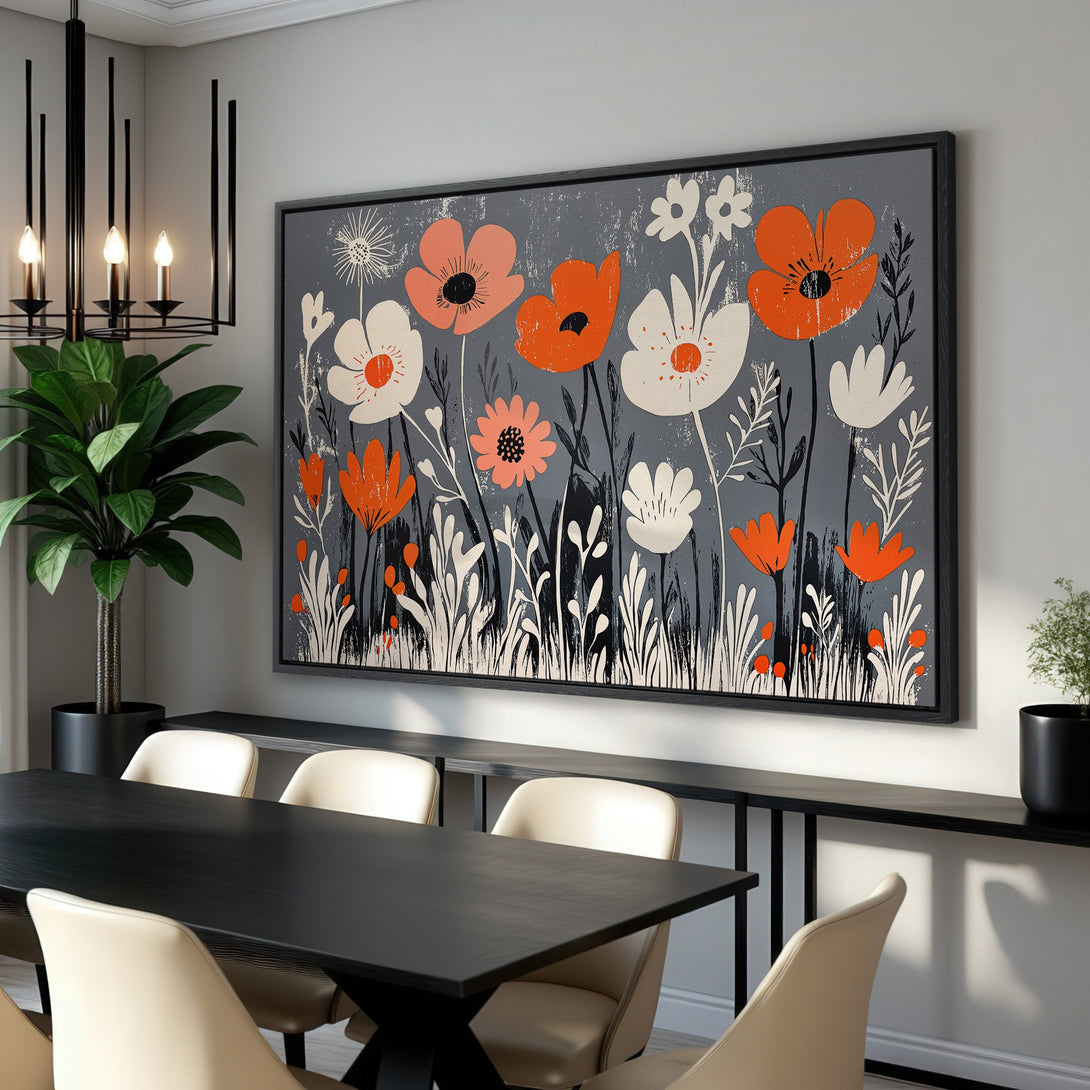Framed Wall Art featuring a modern floral design in orange, white, and black on a gray background. Perfect for adding a pop of color!