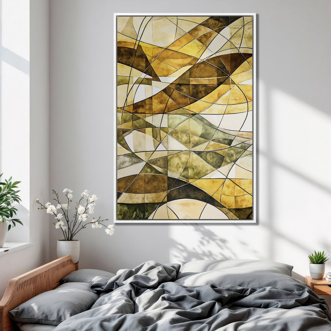 Framed Wall Art featuring an abstract geometric design in warm yellow, brown, and beige tones. Perfect for adding modern style to your bedroom decor.