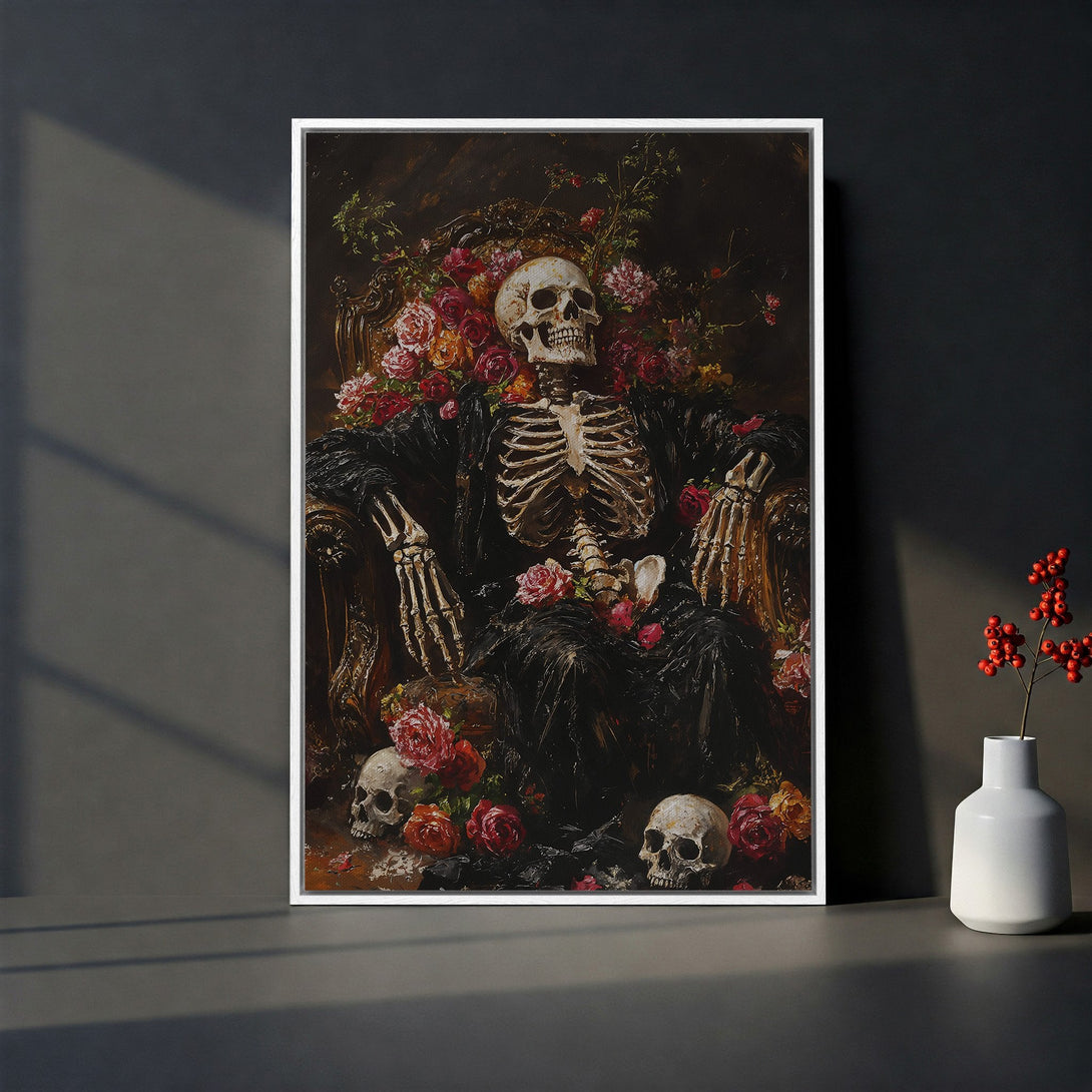 Framed Wall Art featuring a gothic skeleton in a chair with roses. Dark, moody color palette with red and brown tones. Perfect for a unique home decor statement.