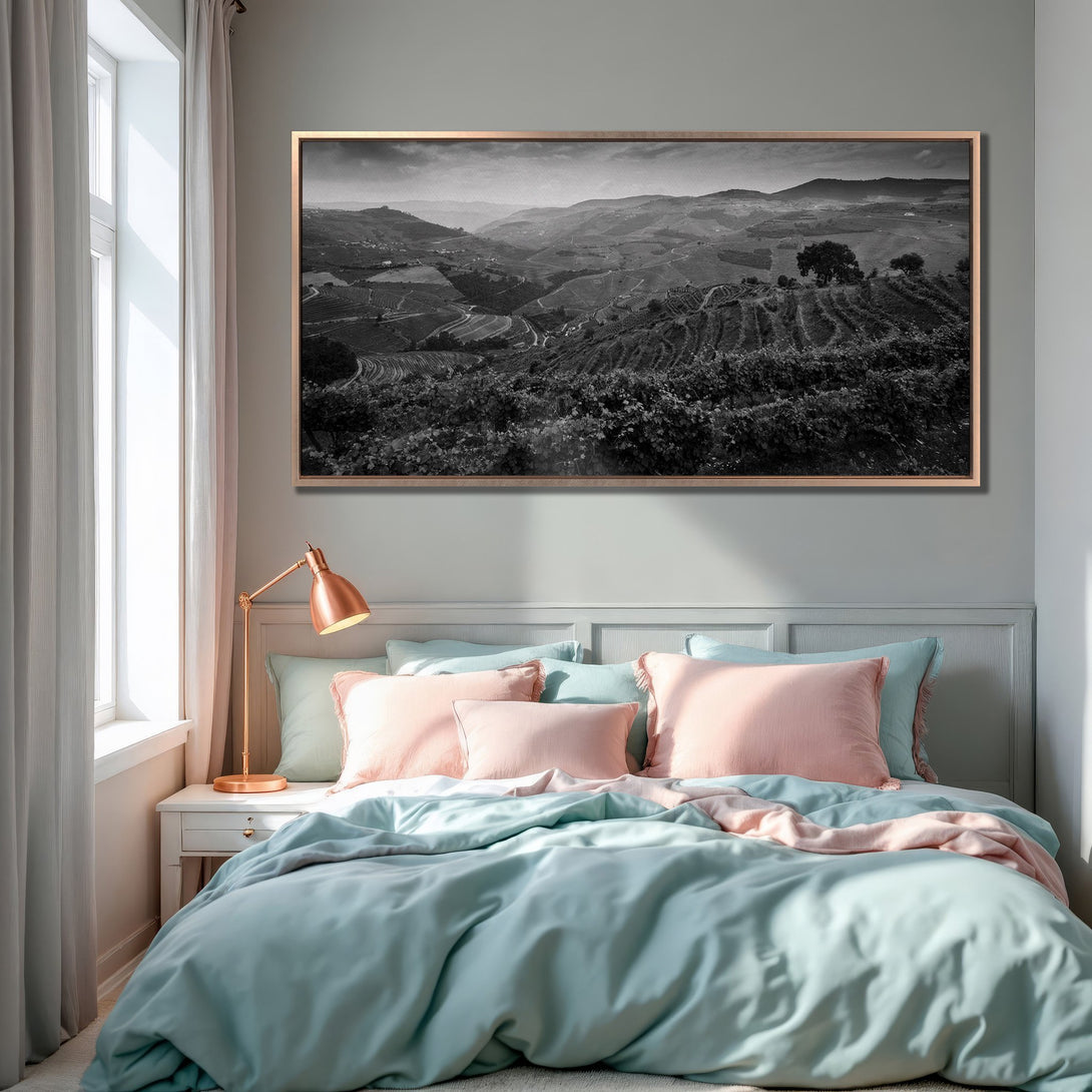 Framed Wall Art featuring a black and white landscape print, adding a touch of elegance to a bedroom with a soft, pastel color palette.
