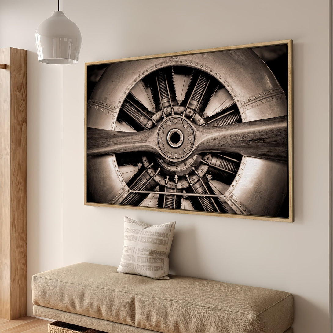 Framed Wall Art: Vintage airplane propeller in sepia tones. Industrial style canvas print for a modern home. Perfect aviation decor.