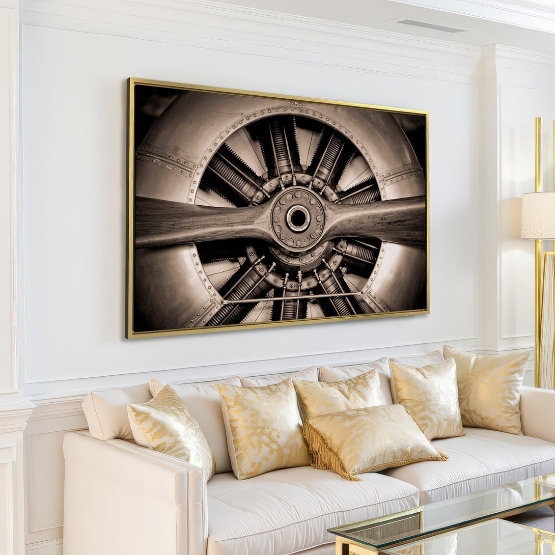 Canvas Print of an airplane propeller in sepia tones, perfect for industrial and vintage decor. Add a unique focal point to your living room!