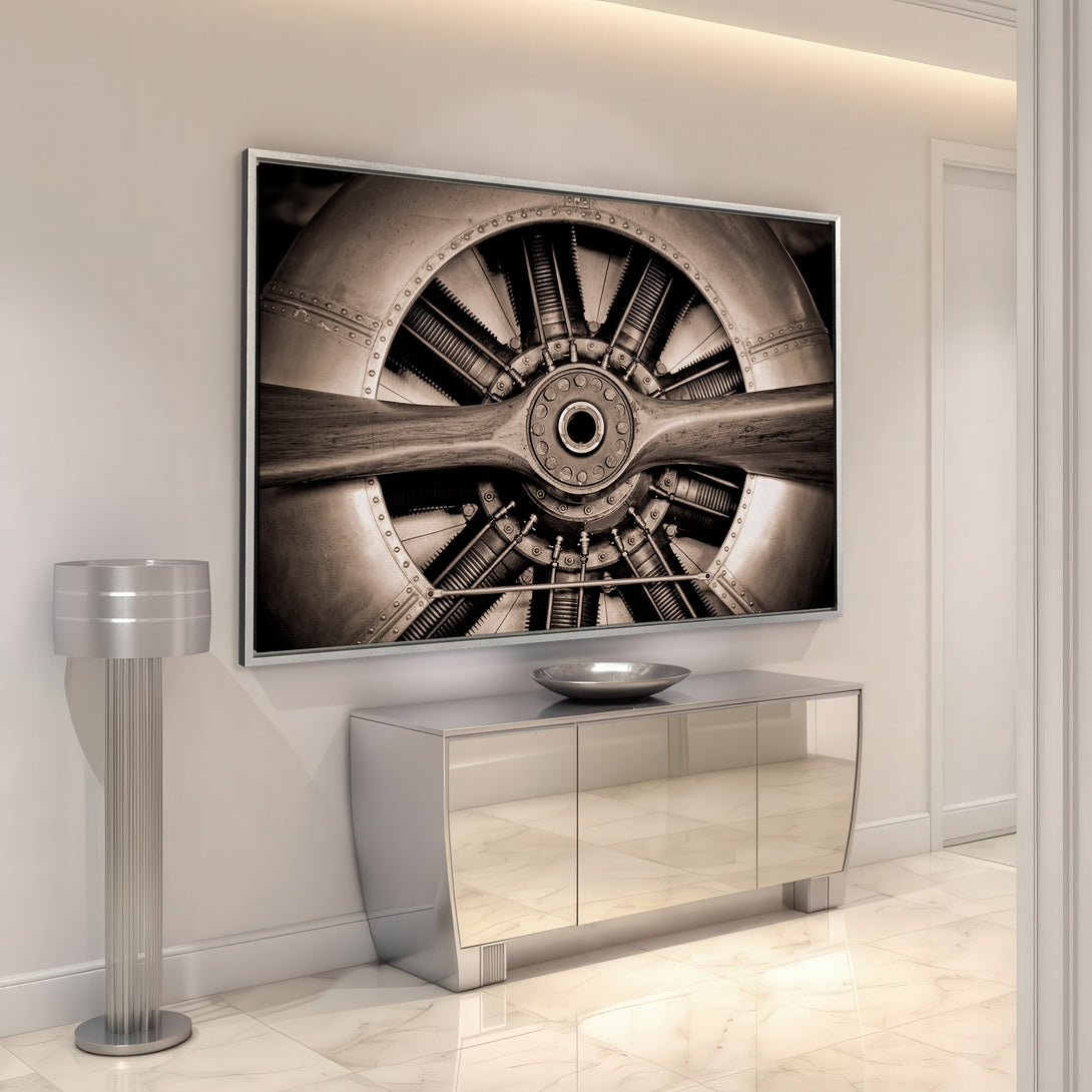 Framed Wall Art: Vintage airplane propeller in sepia tones. Industrial style art perfect for modern interiors. Enhance your space with this unique canvas print.