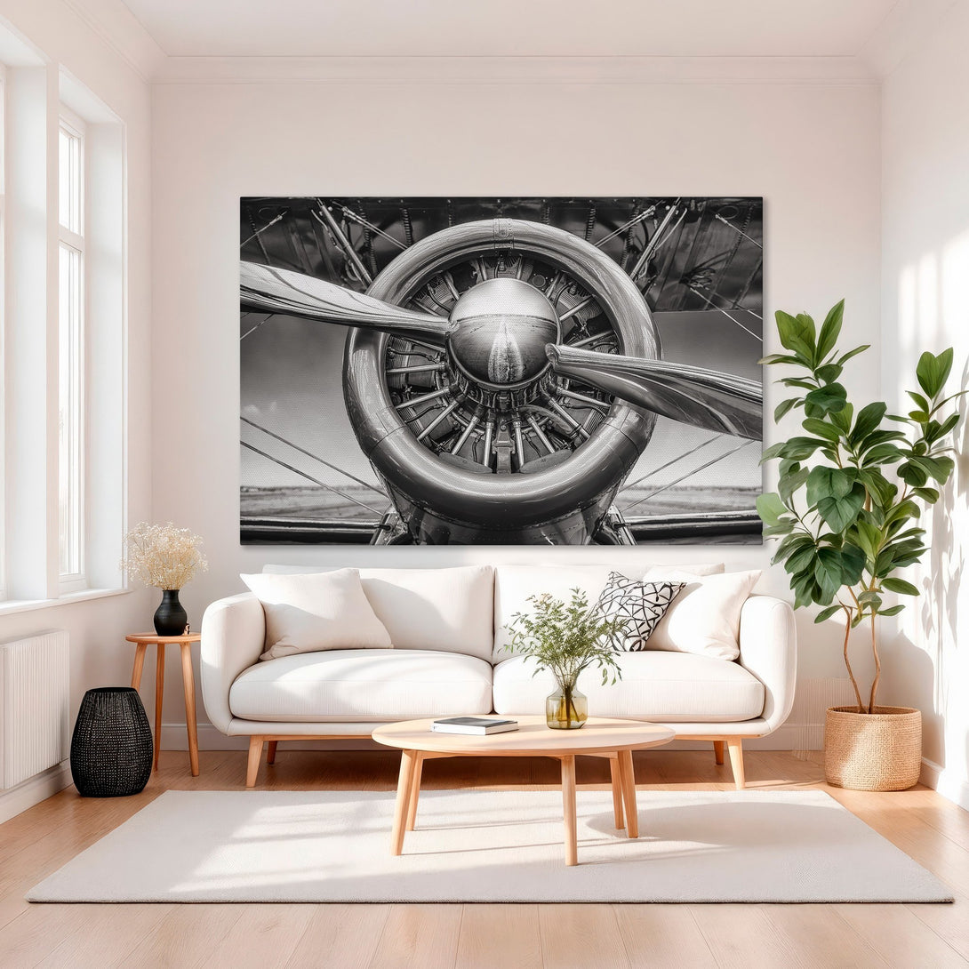 Framed Wall Art: Vintage airplane propeller in black and white. Adds a touch of classic aviation style to any room. Neutral tones complement any decor.