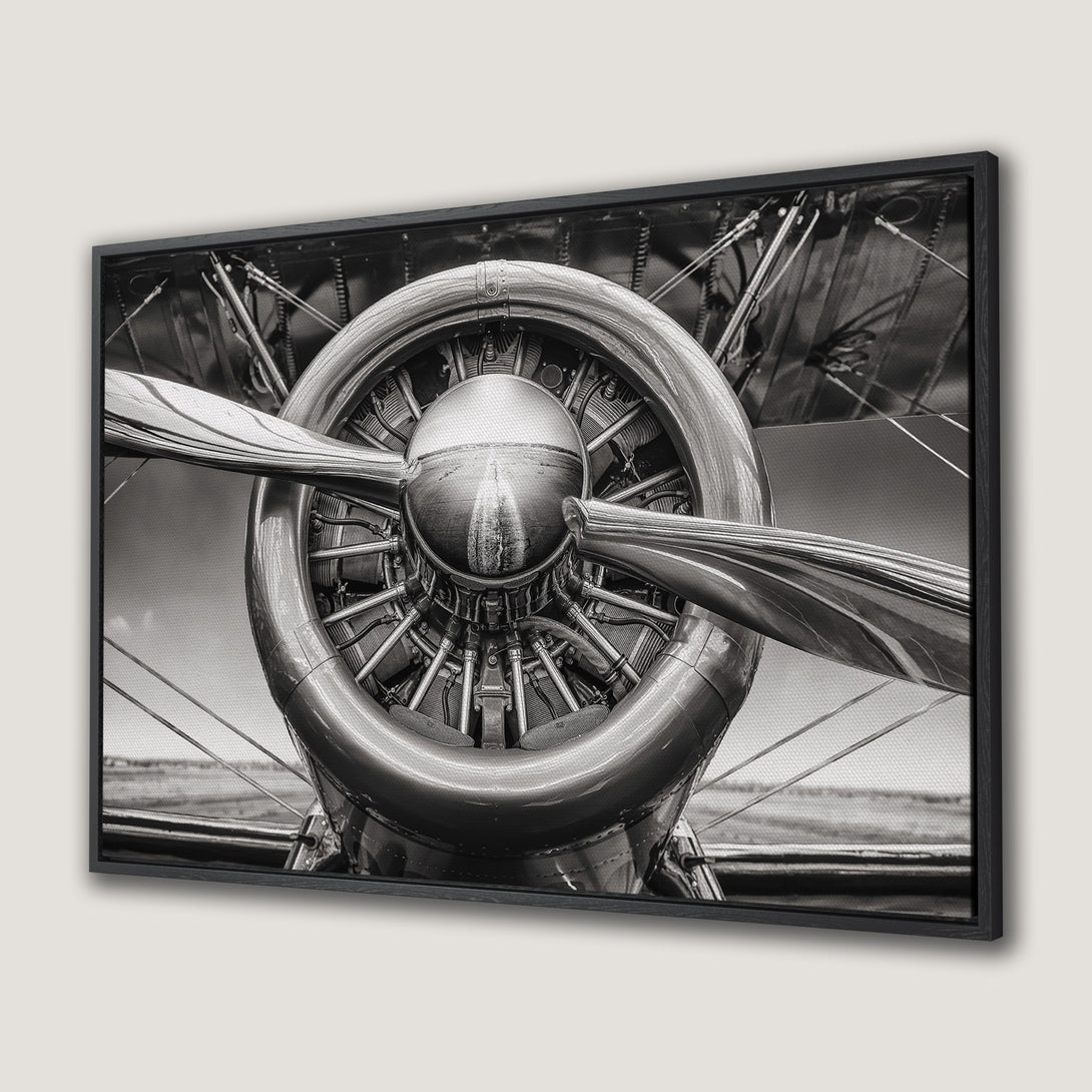 Framed Wall Art: Vintage airplane engine canvas print in monochrome. Industrial style art, perfect for aviation enthusiasts. Black and white color palette.