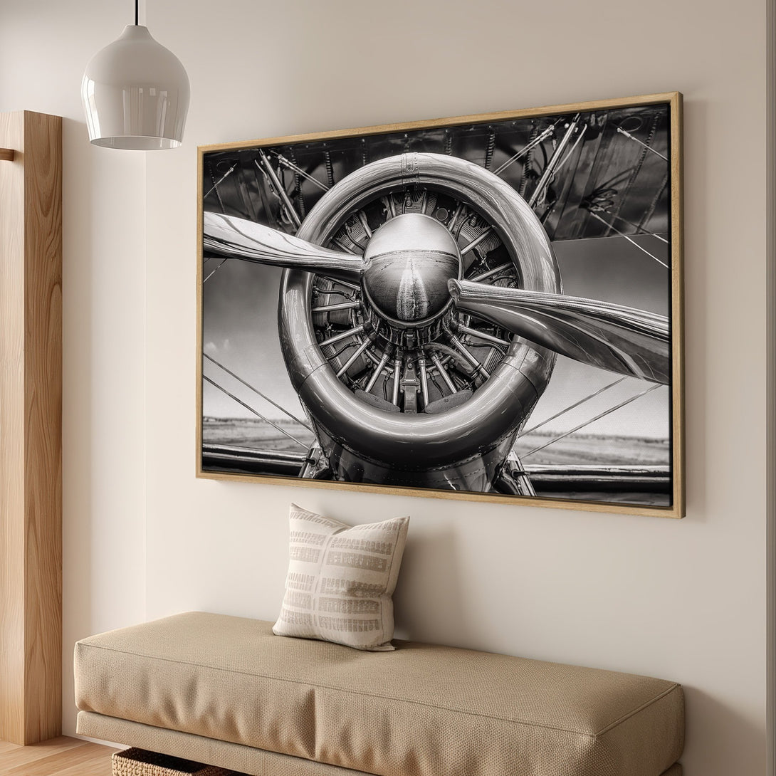 Framed Wall Art: Vintage airplane propeller in striking black and white. Modern decor accent with neutral tones. Perfect for aviation enthusiasts.