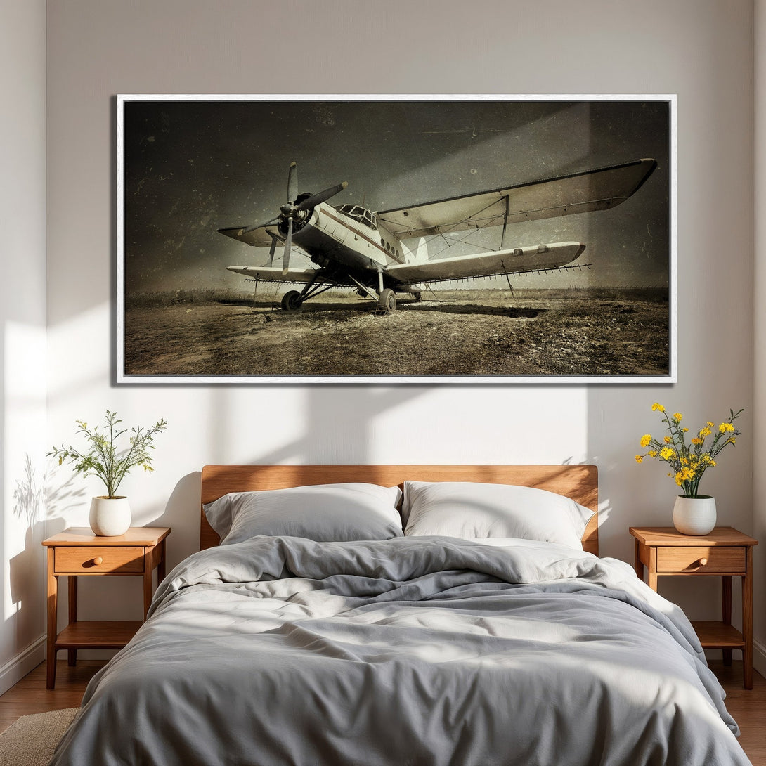 Framed Wall Art: Vintage biplane Canvas Print in sepia tones. Rustic aviation art for a stylish bedroom. Neutral color palette.